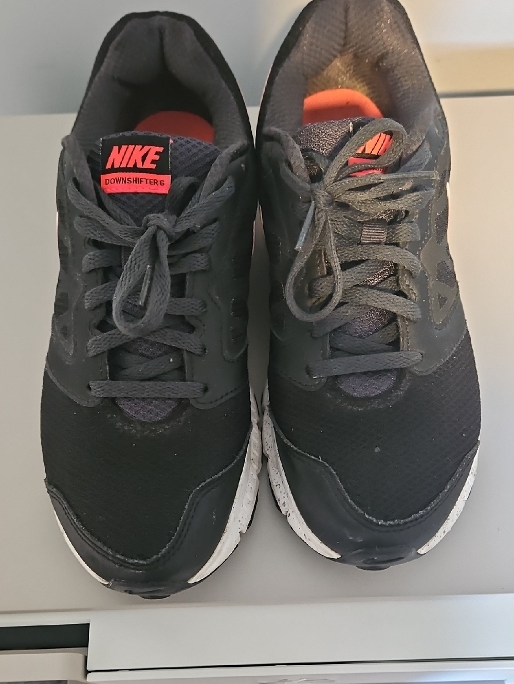 Nike Men’s Black Sneakers with Orange Accents